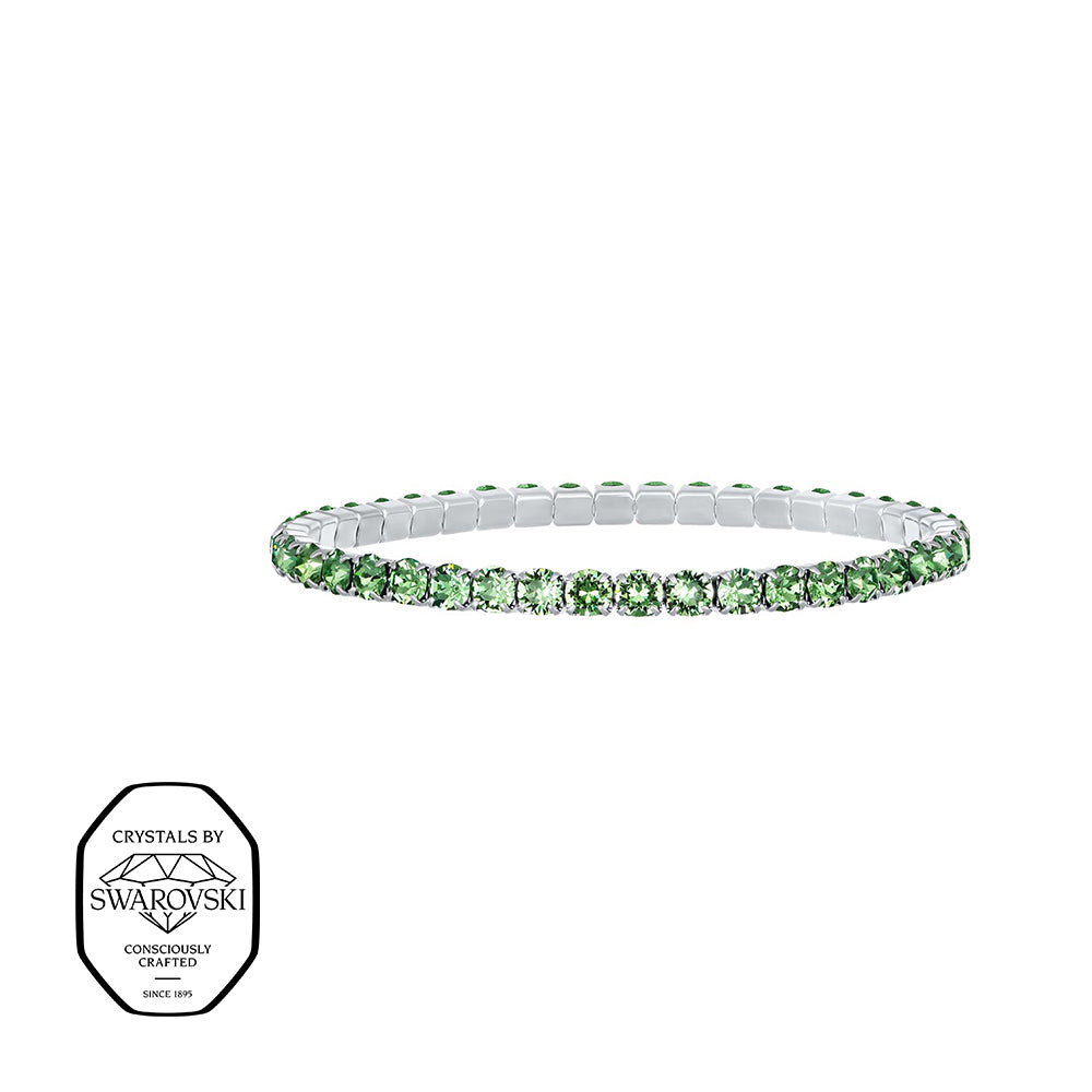 Elegantes Stretcharmband mit grünen Swarovski® Kristallen in silberfarbener Fassung – modern und stilvoll.