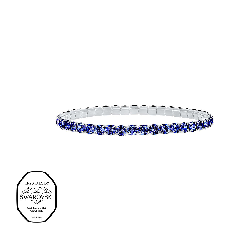 Elegantes Stretcharmband mit blauen Swarovski® Kristallen in silberfarbener Fassung – stilvolles Schmuckstück für jeden Anlass.