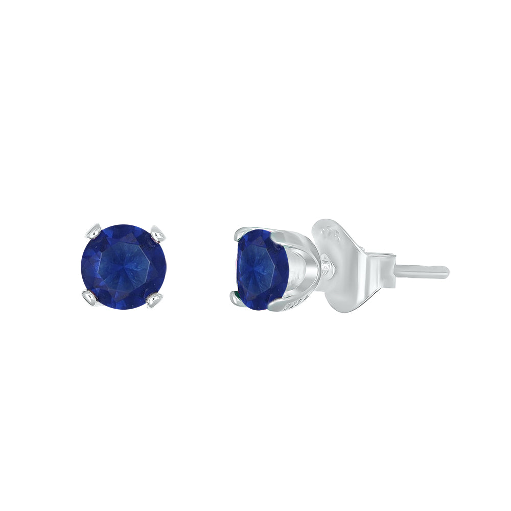 Silberne Ohrstecker mit dunkelblauen Kristallen – eleganter Damenschmuck.