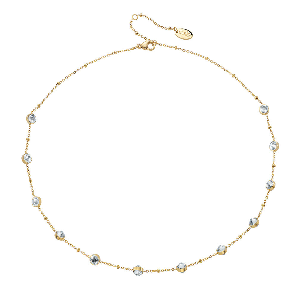 Feine goldfarbene Halskette mit dezent eingefassten, funkelnden Kristallen.