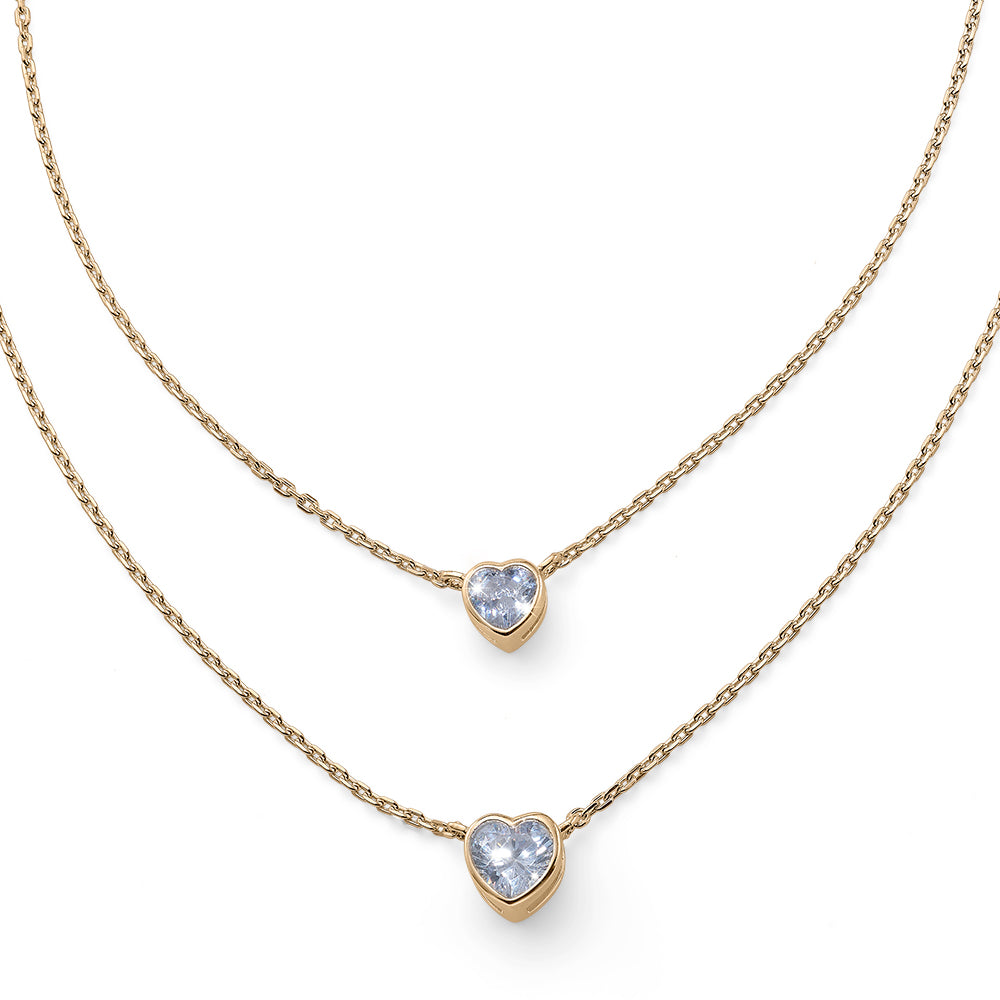 Doppellagige goldfarbene Halskette mit zwei herzförmigen Kristallanhängern von Crystalp