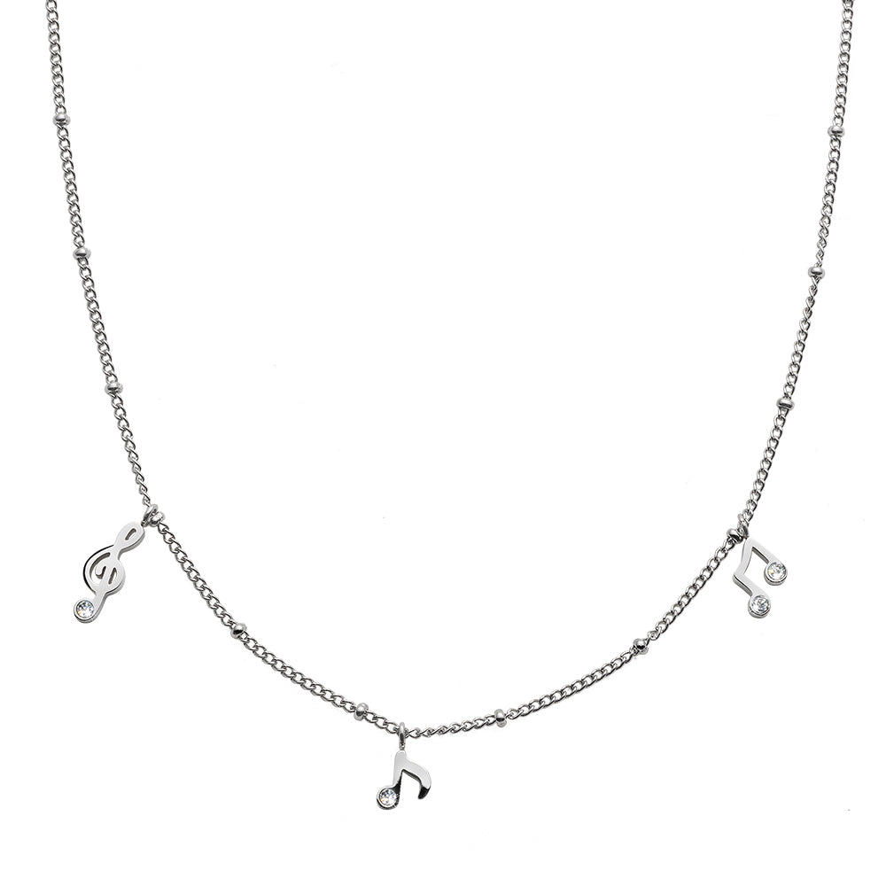 Silberfarbene Halskette mit kleinen Musiknoten- und Violinschlüssel-Anhängern, verziert mit funkelnden Ziersteinen.