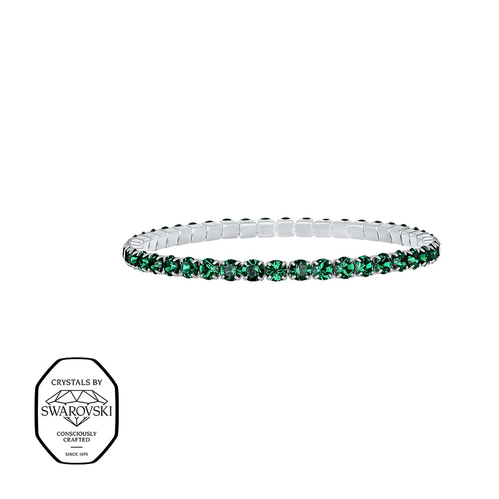 Schmales Stretcharmband mit grünen Swarovski® Kristallen in silberfarbener Fassung – elegant und flexibel tragbar.