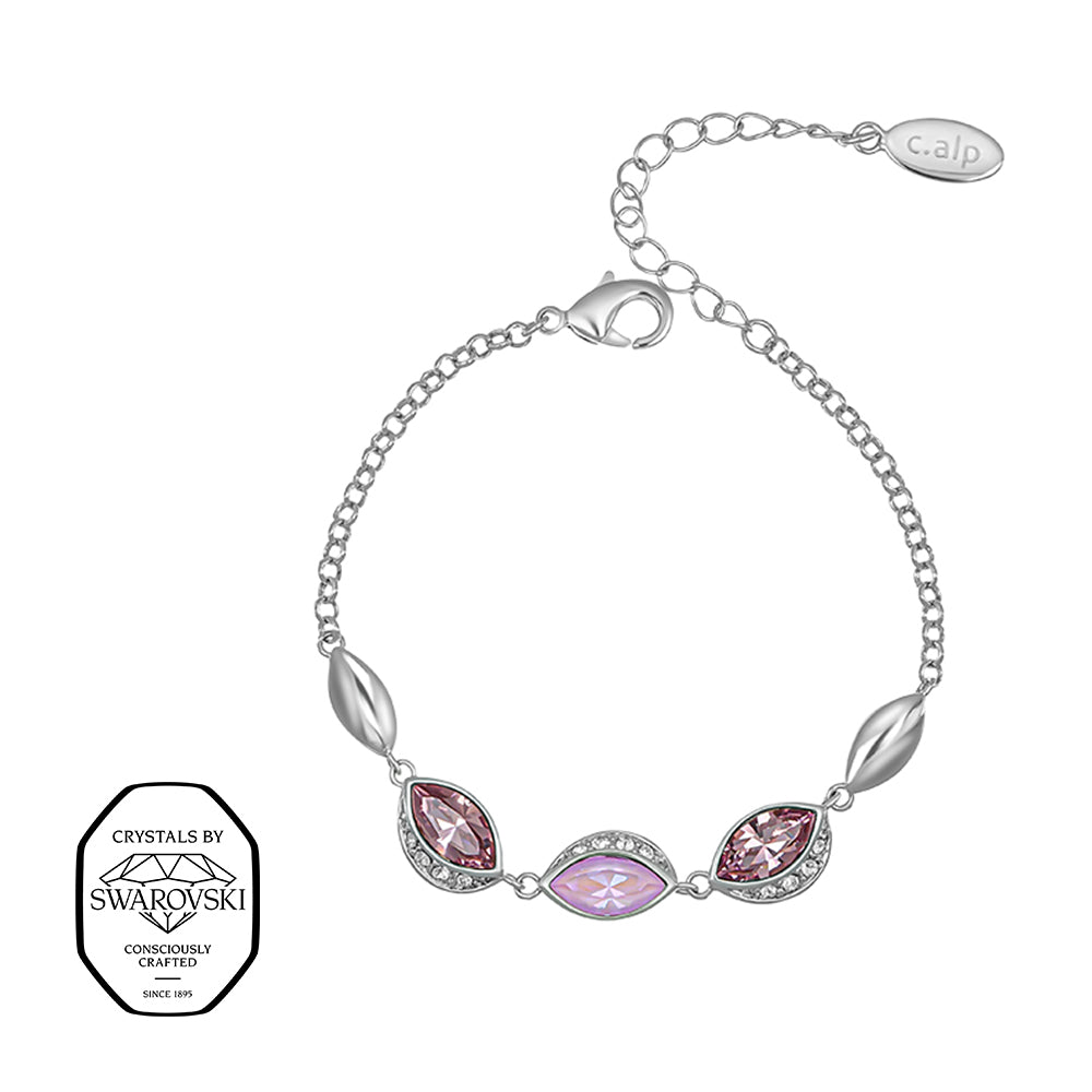 Feines Silberarmband mit drei Swarovski® Kristallen in Rosa- und Violetttönen in Blattform, umrahmt von kleinen weißen Kristallen, an eleganter Gliederkette mit Verlängerung.