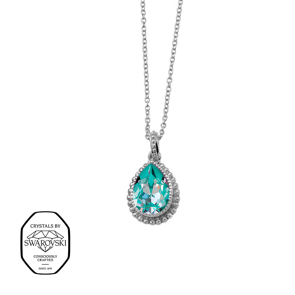 Silberfarbene Halskette mit tropfenförmigem, türkisfarbenem Swarovski® Kristall und funkelnder Kristallumrandung.