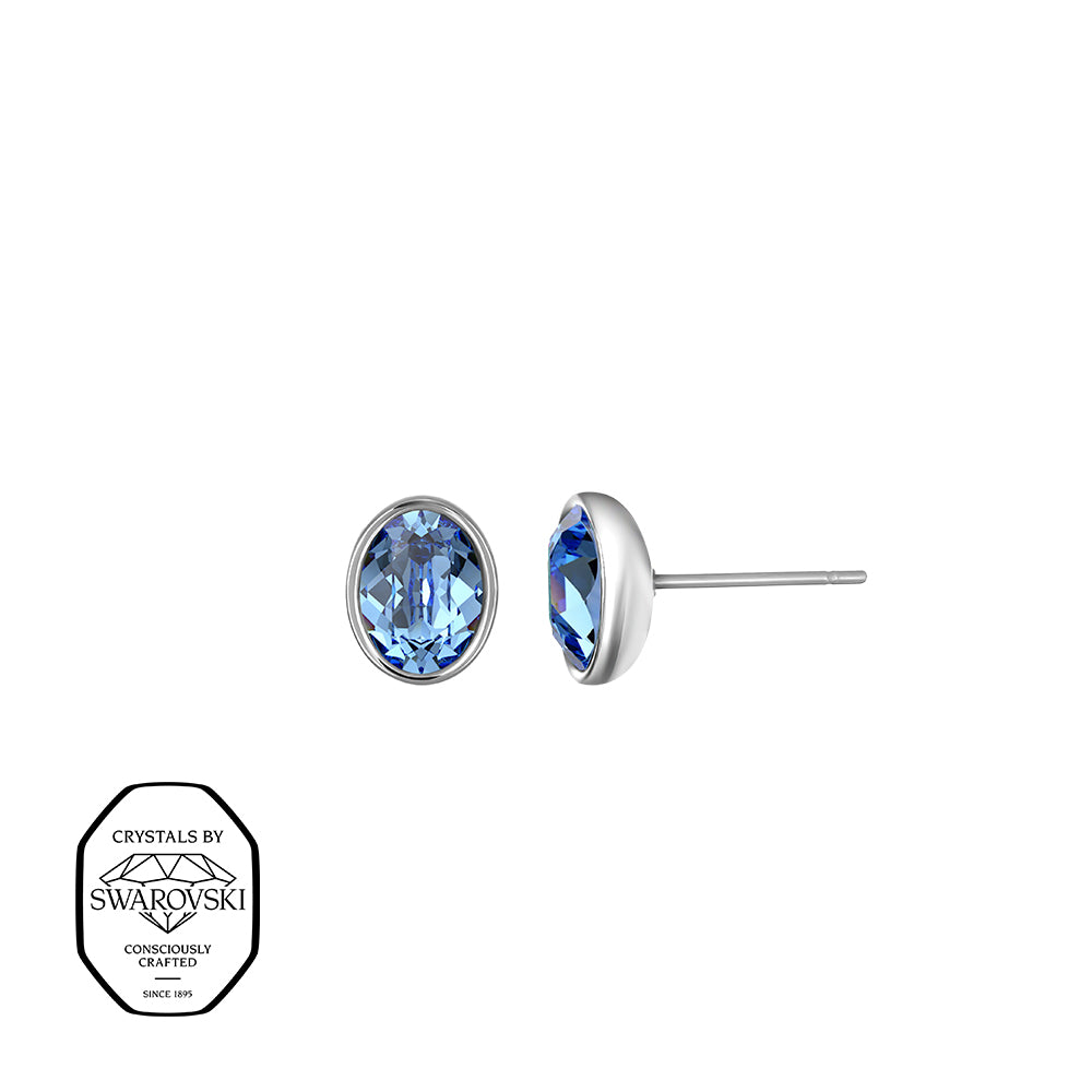 Steckerohrringe mit ovalem Swarovski® Kristall in Blau – elegante Ohrstecker in silberfarbener Fassung.