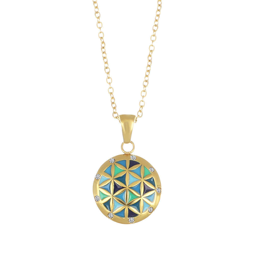 Goldener Edelstahl Anhänger rund mit Mosaik in Blau Grün und funkelnden Kristallen inspiriert von Al Andalus filigran und edel
