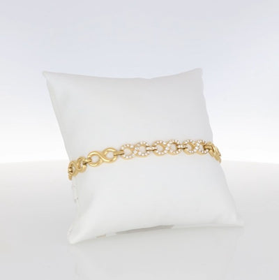 Crystalp Paris Glance Bracelet aus Edelstahl in Gold, Armband mit geschwungenen Gliedern und Swarovski® Kristallen verziert