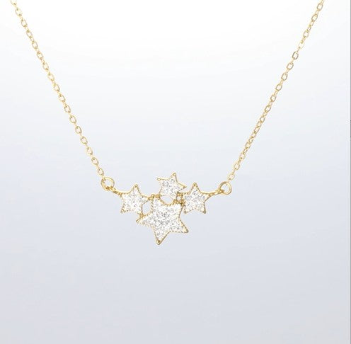 Crystalp My Stars Pendant aus Edelstahl in Gold mit funkelndem Stern-Design für himmlische Eleganz