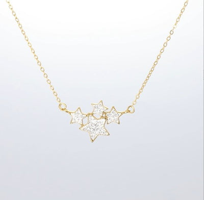 Crystalp My Stars Pendant aus Edelstahl in Gold mit funkelndem Stern-Design für himmlische Eleganz